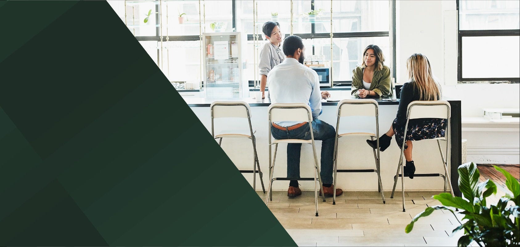 Coworkers having a chat in the company breakroom